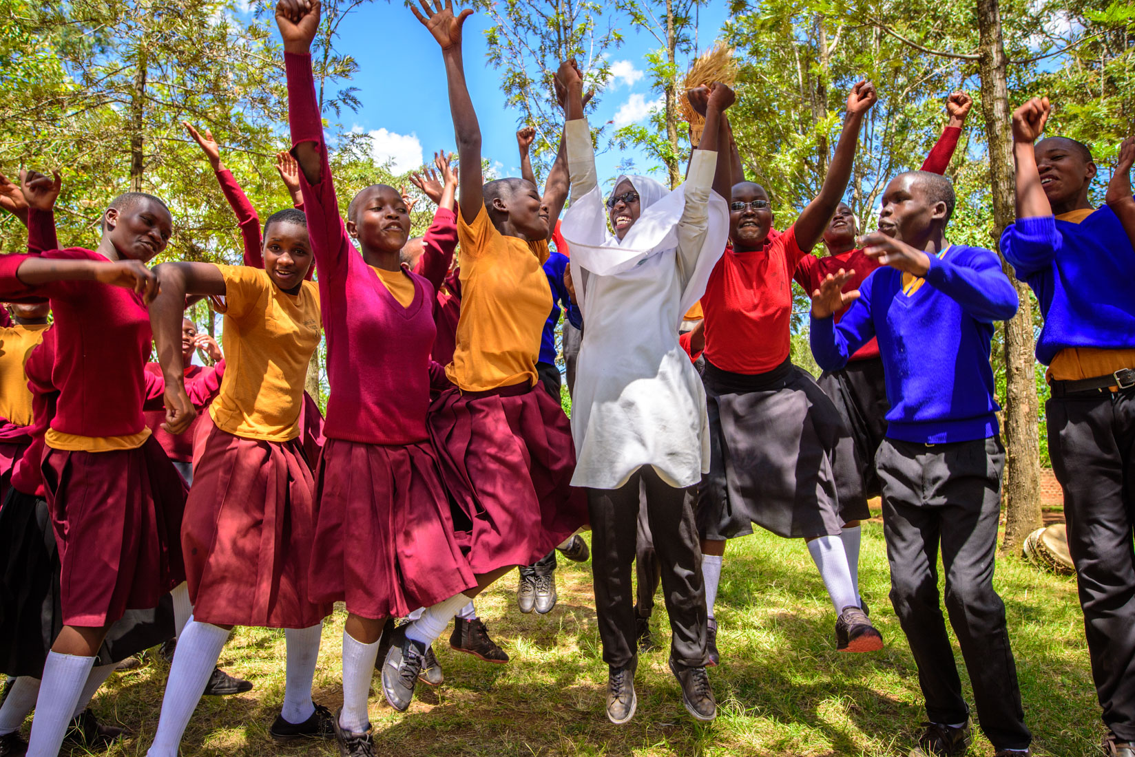 Group of adolescents dancing.